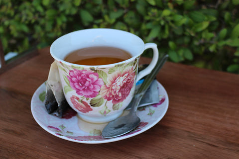 Cup of Tea on Saucer with Teaspoon