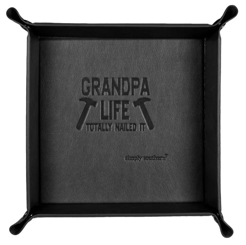 Embossed and foldable vegan leather trays